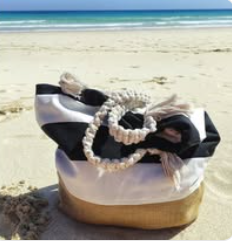 Bolso Tamyraki — origen: , 